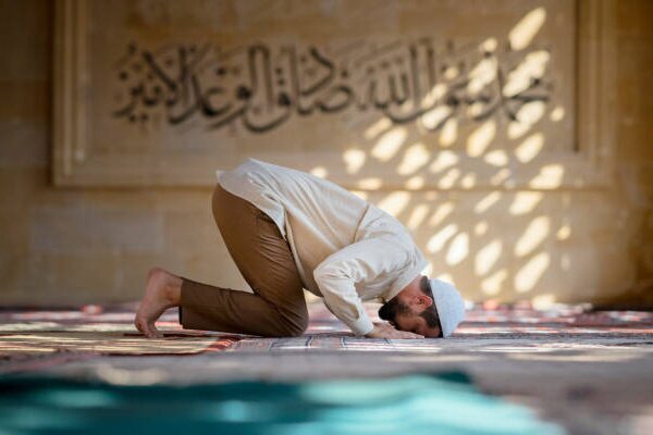 Muslim saying prayer