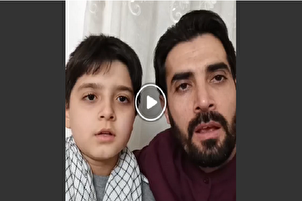 视频/父子俩诵读《古兰经》城镇章